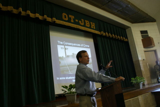 Judge Scott Crichton illustrates the consequences of crime with a video during his "Don't Let This Be You" presentation at Oak Terrace Alternative Midle School: May 15, 2009.