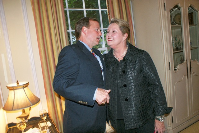 Caddo Judge Scott Crichton shares a private moment with Chief Justice Kimball at Ron Miciotto reception in her honor April 30th