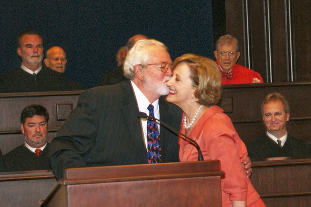 Elizabeth "Beth" Erny Foote, from Alexandria, is kissed by her bother, the Honorable John Joseph Erny, (retired judge of the 17th Judicial District) after her swearing-in 9-10-10