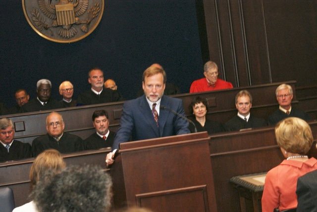 Caddo District Court Judge Scott Crichton addresses the audience as the Federal Judges from Western District of Louisiana watch the ceremonies for the investiture of Erny "Beth" Foote September 10th, 2010.