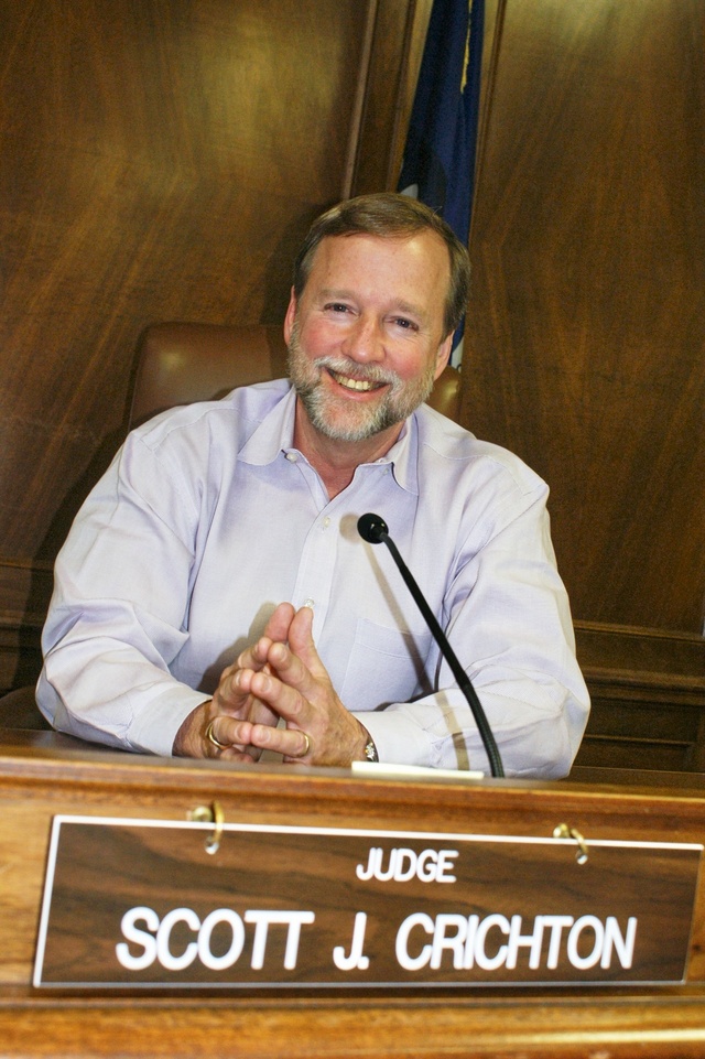 Professional photographer Tom Pace captures another smile on Judge Crichton after his podcast interview for www.ShreveTalk.com & JudgeScottCrichton.com 4-14-2010