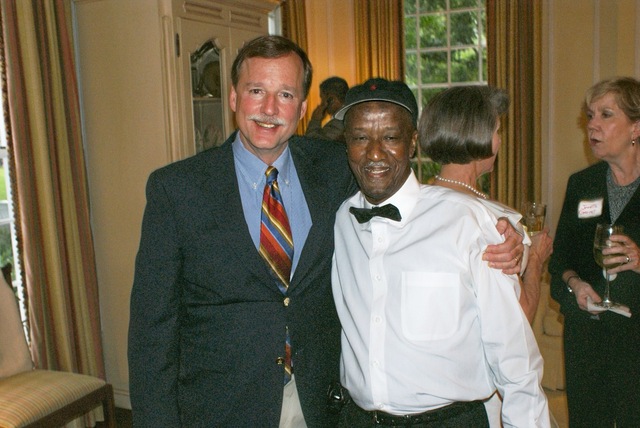 Caddo Judge Scott Crichton stands with Jessie Thomas at Ron & Natalie Miciotto's Reception honoring La. Supreme Court Chief Justice Kitty Kimball April 30th, 2009