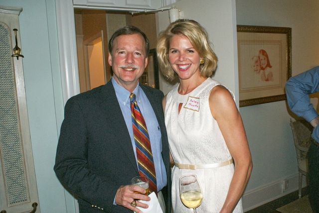 Caddo Judge Scott Crichton smiles for the camera with Natalie Miciotto during the reception honoring Chief Justice "Kitty" Kimball April 30th, 2009