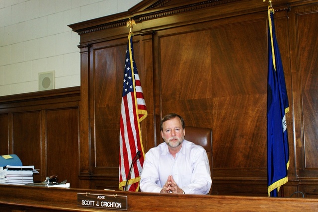 A rare look ay Judge Crichton sitting at the bench (un-robed) inside his Courtroom B at Caddo Parish Courthouse 4-14-2010. Photo by Tom Pace